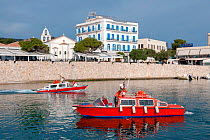 Red water taxi, Dapia, Spetses Island, Aegean Sea, Greece, Mediterranean, April 2009