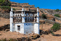 Tinos Dovecotes, The island of Tinos is famous for its many intricately designed dovecotes. Tinos island, Cycladic islands, Aegean Sea, Greece, Mediterranean, August 2014.