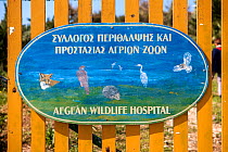 Aegean Wildlife Hospital sign, Paros Island, Cyclades, Aegean Sea, Mediterranean, Greece.  October 2014