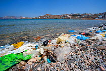Plastic litter on beach, Mykonos island. Mykonos island, Cyclades, Aegean Sea, Mediterranean, Greece, August 2007.