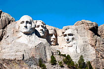 Mount Rushmore, with the iconic carvings of presidents Washington, Jefferson, Lincoln and Thoedore Roosevelt, Rushmore National Monument, South Dakota, USA. September 2013.