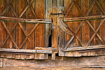 Wooden doorway in Musteika Village, on the border of the Cepkeliai reserve and the Dzukija National Park, Lithuania, May 2015.