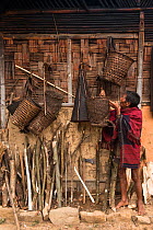 Man with Chang Naga baskets. Chang Naga Tribe. Tuensang district. Nagaland, North East India, October 2014.