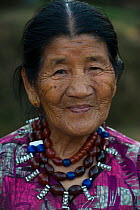 Portrait of elderly Ao Naga woman, Mokokchung district. Nagaland, North East India, October 2014.
