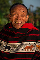 Ao Naga man in traditional shawl, Nagaland, North East India, October 2014.
