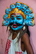 Mising woman in a Kali mask for Raas festival, Majuli Island, Brahmaputra River, Assam, North East India. October 2014.