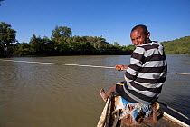 Crossing Blue Nile river on boat. Bahir Dar, Lake Tana Biosphere Reserve, Ethiopia. December 2013.