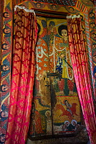 Colourful religious paintings in Ura Kidane Mehret, church of the Ethiopian Orthodox Church, Zege Peninsula, Lake Tana Biosphere Reserve, Ethiopia. December 2013.