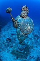 The Guardian Of The Reef Statue, with diver, Lighthouse Point. Grand Cayman, Cayman Islands, Caribbean Sea.