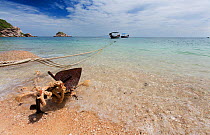 Boats anchored to the shore at Tanote Bay, Koh Tao Gulf of Thailand Thailand, October 2013.