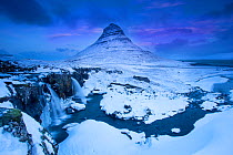 Kirkjufell mountain, landscape at dawn with waterfall in foreground, Snaefellsnes peninsula, Iceland, January 2015