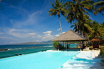 Swimming pool outside Lotus Bungalow, Candidasa, Bali Island, Indonesia, Pacific Ocean. September 2006.