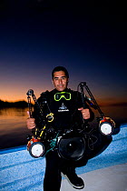 Underwater photographer Franco Banfi with camera and lighting equipment to photograph Humboldt squid (Dosidicus gigas) at night off Santa Rosalia, Sea of Cortez, Baja California, Mexico, East Pacific...