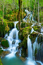 Water cascading down Toberia falls, Andoin, Sierra Entzia Natural Park, Alava, Basque Country, Spain, April.