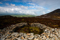 Iron age hut circle, within the Tre'r Ceiri  Hill Fort, above Nefyn, Gwynedd, Wales, September 2013.