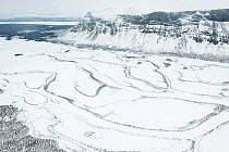 View over the snow-covered Laitaure Delta and Rapa River, Laponia World Heritage Site, Lapland, Sweden, April 2013.