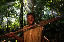 Baka man with spear, which has been handed down from generation to generation, South East Cameroon, July 2008.