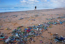 Beach littered with rubbish, Fonte da Telha Beach, Portugal, February 2014.
