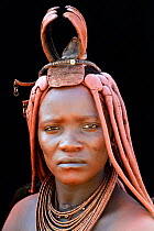 Portrait of Himba woman with traditional hair style, Kaokoland, Namibia October 2015