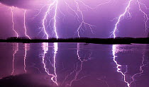 Lightning storm over Lake Csaj, Kiskunsagi National Park, Pusztaszer, Hungary. May 2012.