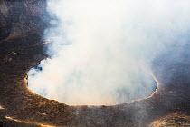 Steam rising from active lava lake in the crater of Nyiragongo Volcano, Virunga National Park, North Kivu Province, Democratic Republic of Congo. September 2015.