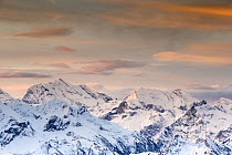 Winter landscape with view towards the high Swiss Alps at sunset. Bernese Alps, Switzerland, November 2014