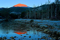 El Reloj Mountain at dawn and frozen  Gaduares River, Sierra de Grazalema Natural Park, southern Spain, January.