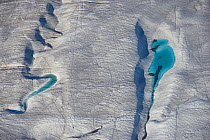 Aerial view of meltwater channels in ice, Axel Heiberg Island, Nunavut, Canada, August 2007.