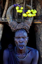 Woman wearing traditional headdress. Mursi tribe, Mago National Park. Omo Valley, Ethiopia.