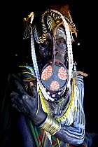 Mursi woman with large clay lip plate and headdress. Mago National Park. Omo Valley, Ethiopia.