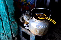 Kettle and strainer to make Ethiopian coffee, Danakil depression, Afar Region, Ethiopia, Africa. November 2014.