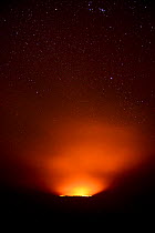 Erta Ale volcano illuminates the starry night. Afar Region, Ethiopia, Africa. November 2014.