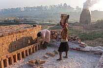 People working in or near so called brick ovens near Fianarantsoa, Madagascar, October 2015