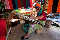 Kayan woman weaving, Thailand. November 2015.