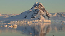 View of floating ice and mountains at sunset, Gerlache Strait, Antarctic Peninsula