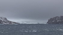 White capped waves in Neptune's Bellows, Deception Island, South Shetland Islands.