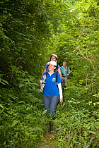 Anne Savage, Rosamira Guillen and Project / Proyecto Titi team walking through tropical dry forest, looking for Cotton-top tamarins (Saguinus oedipus) El Ceibal, Colombia. July 2008. Critically endang...