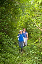 Anne Savage,  Rosamira Guillen and Project / Proyecto Titi team walking through tropical dry forest, looking for Cotton-top tamarins (Saguinus oedipus) El Ceibal, Colombia. July 2008. Critically endan...