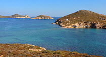 Agios Georgios Island, Kentronisi Islet and Cape Tripiti, Livadi Geranou, Patmos, Dodecanese Islands, Greece, August 2013.