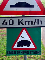 Hippopotamus (Hippopotamus amphibius) warning sign, St Lucia, KwaZulu-Natal, South Africa.