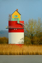 Small house on replica tower in thermal power station, a work of art by Japanese artist Tatzu Nishi, Cordemais, Loire-Atlantique, France 2015