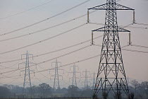 High voltage power lines and pylons in the countryside, Gloucestershire, UK.  March 2015.