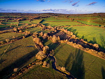 River Eye flowing through water meadows, Greystones Farm Nature Reserve, Site of Special Scientific Interest (SSSI), Gloucestershire Wildlife Trust.  Aerial drone with CAA permit. November 2015.