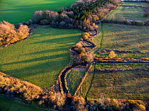 River Eye flowing through water meadows, Greystones Farm Nature Reserve. Site of Special Scientific Interest (SSSI), Gloucestershire Wildlife Trust.  Aerial drone with CAA permit. November 2015.