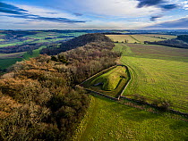 Aerial view of Belas Knap, a neolithic chambered long barrow on the Cotswold Way, Winchcombe, Gloucestershire, UK. Shot by aerial drone with CAA permit. January 2016.
