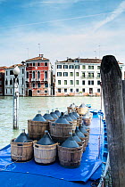 Flasks of Olive Oil awaiting delivery, Venice, Italy, April.