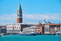 Adriatic coastline and waterfront of Venice with prominent bell tower in St Marks Square, Italy, April.