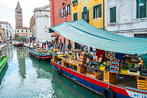 Fruit and vegetables for sale on barge, Rio de Santa Barnaba, Venice, Italy, April