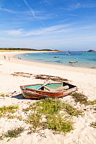 Old rowing boat on Par Bay, St. Martin's, Isles of Scilly, England. August 2013.