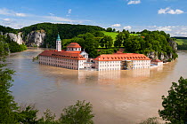 Danube flooding with Weltenburg Monastery protected by flood control measures,  Weltenburger Enge Nature Reserve, Kelheim county, Bavaria, Germany, June 2013